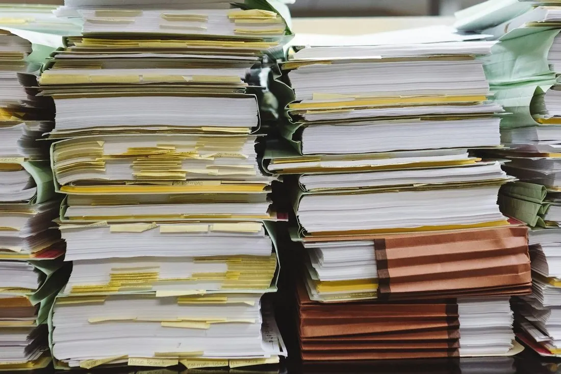 Stacks of tabbed paper applications