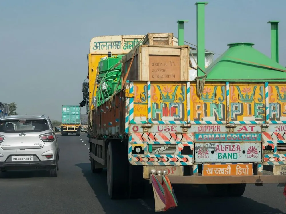 A painted goods truck on the highway