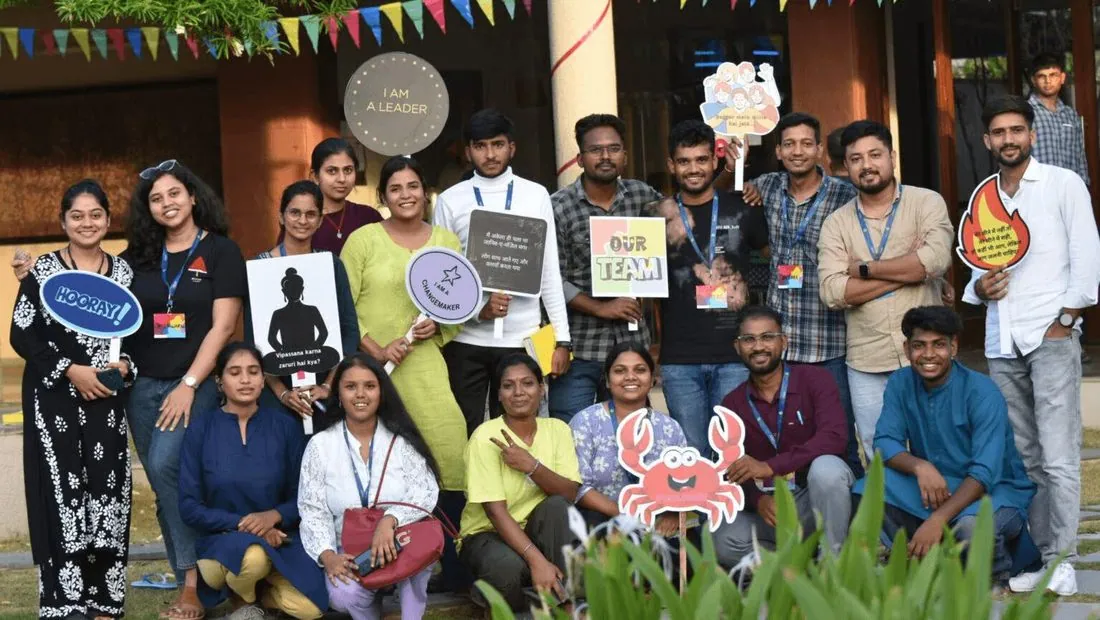 A group of young people holding placards