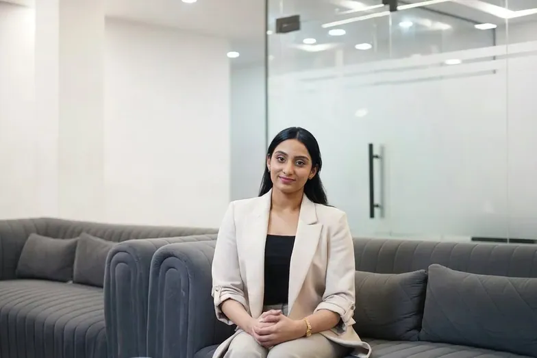 A woman standing in an office