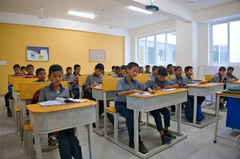 Boys at their desks in a classroom