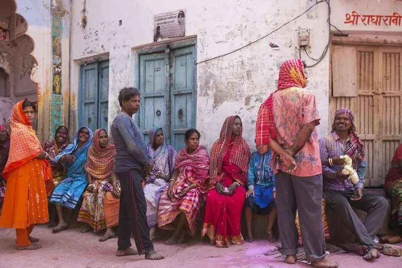 Villagers gathered together in a lane