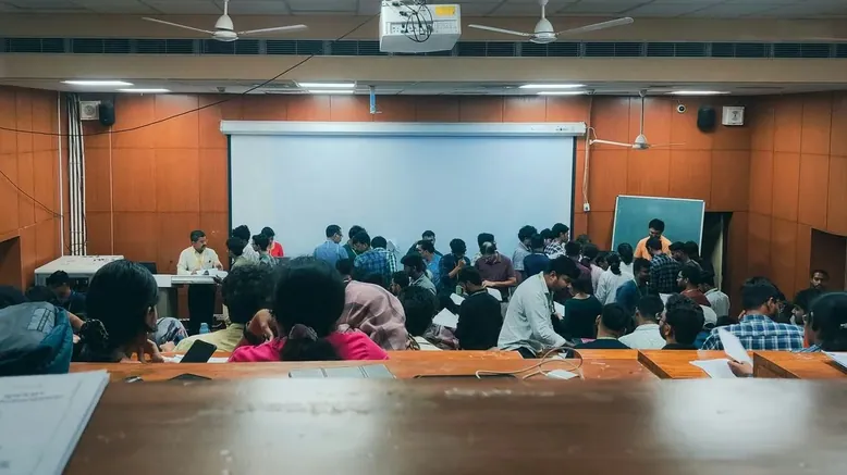 A hall full of people at a meeting